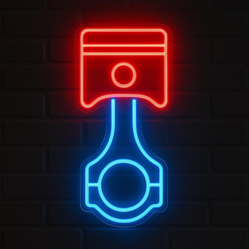 Neon sign of a piston in red and blue colors, ideal for automotive enthusiasts.