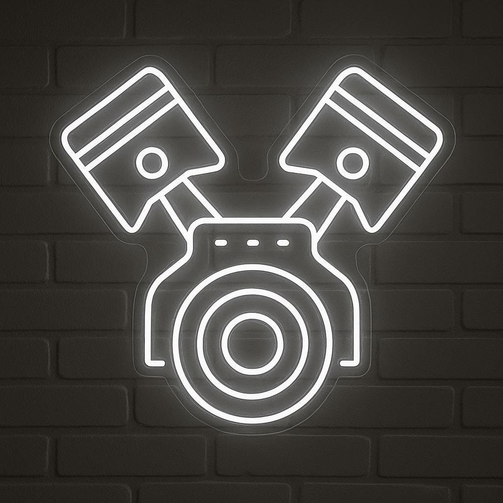 Neon sign of an engine, perfect for car enthusiasts and garages.